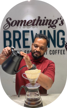 Somethings Brewing Barista brewing coffee