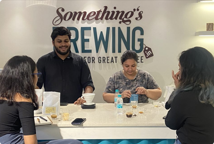 Something's Brewing Barista brewing coffee